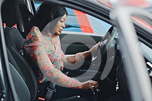 African American businesswoman happy with keys to new car