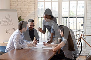 African American businesswoman hold meeting brainstorm with multiethnic colleagues