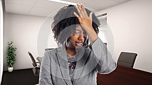 African American Businesswoman In an Office Making a Mistake