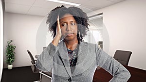 African American Businesswoman In an Office Making a Mistake