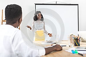 african american businesswoman presenting new business concept to photo