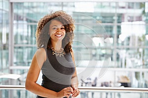 African American businesswoman smiling portrait, waist up