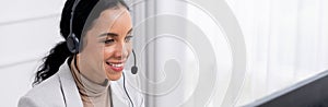 African American businesswoman wearing headset working in crucial office