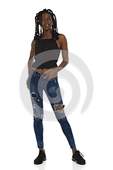 African American Casual Woman With Braided Hair IsStandinf. Full Length. Front View