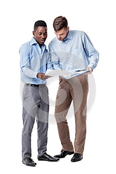 African-American and Caucasian businessman looking at documents