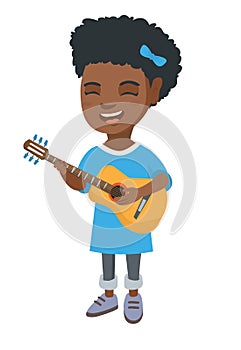 African girl singing and playing acoustic guitar.