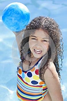 African American Child Playing In Swimming Pool