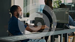 African american coder developing app interface with html code and script