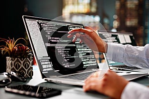 African American Coder Using Computer At Desk