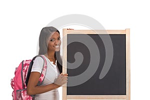 African American College student by blackboard