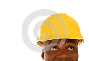 African american construction worker looking up