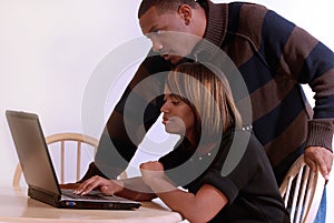 African-American couple at the computer