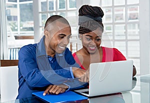 African american couple at computer