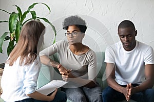 African American couple consulting with relationships expert saving marriage