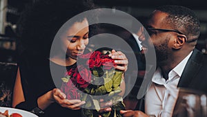 African American Couple Dating in Restaurant