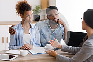 African American Couple Having Financial Consultation In Advisor`s Office