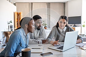 African American couple listening to their financial planner at home