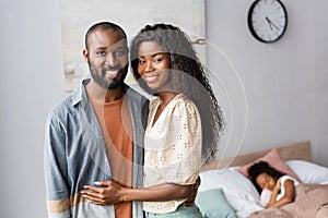 African american couple looking at camera