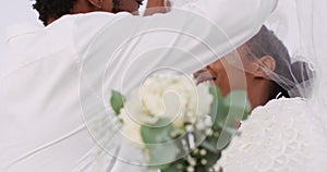 African american couple in love getting married, smiling and dancing on the beach