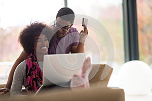 African american couple shopping online