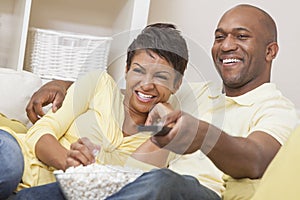 African American Couple Watching Television