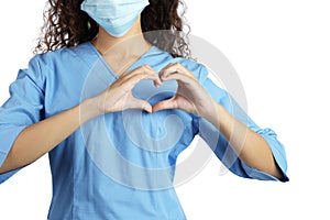 African-American doctor in protective mask making heart with hands on white background, closeup