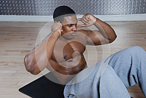 African american doing sit ups and crunches