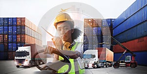 African American engineer they are working in container area  logistics transportation import export or shipping industry , delive