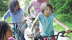 African American Family On Cycle Ride In Countryside