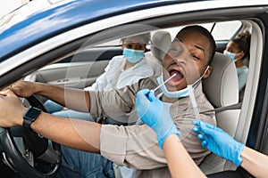 African American Family Getting Tested For Covid-19 Sitting In Car