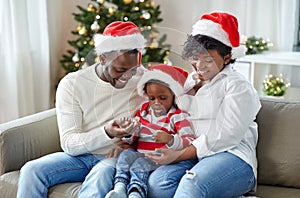 african american family at home on christmas