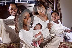 African American family with newborn baby