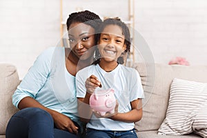 African american family saving money for college