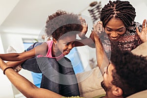 African american family spending time together at home.