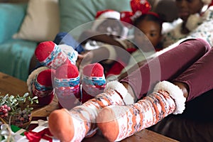 African american family spending time together and siting on the sofa