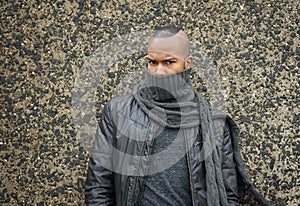 African american fashion model with scarf covering face