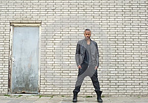 African american fashion model standing in urban environment