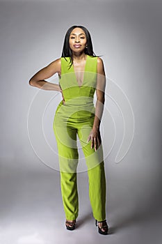 African American Fashion Model Wearing a Lime Green Jumpsuit