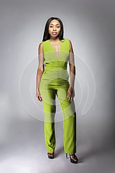 African American Fashion Model Wearing a Lime Green Jumpsuit