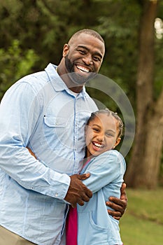 African American father and daughter.