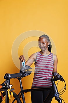 African American Female Cyclist at Work