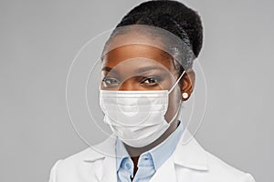 African american female doctor in facial mask