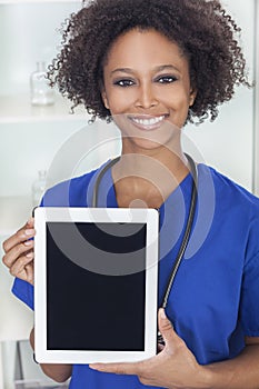 African American Female Doctor & Tablet Computer