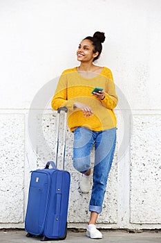 African american female traveler standing outdoors