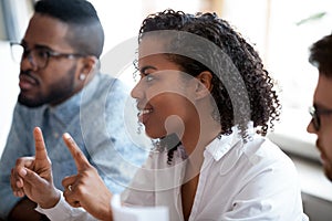 African american female worker involved in team discussion brainstorm