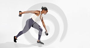 African American Fitness Woman Exercising With Dumbbells On White Background