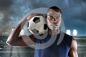 African American Footballer Holding Ball