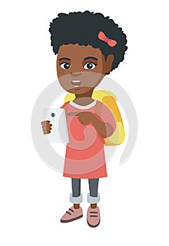 African girl with backpack pointing at cellphone.