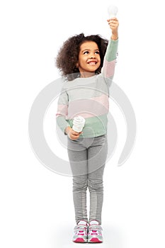 african american girl with different light bulbs