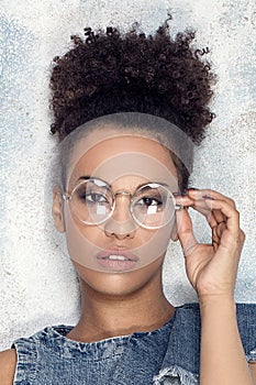 African american girl in eyeglasses.